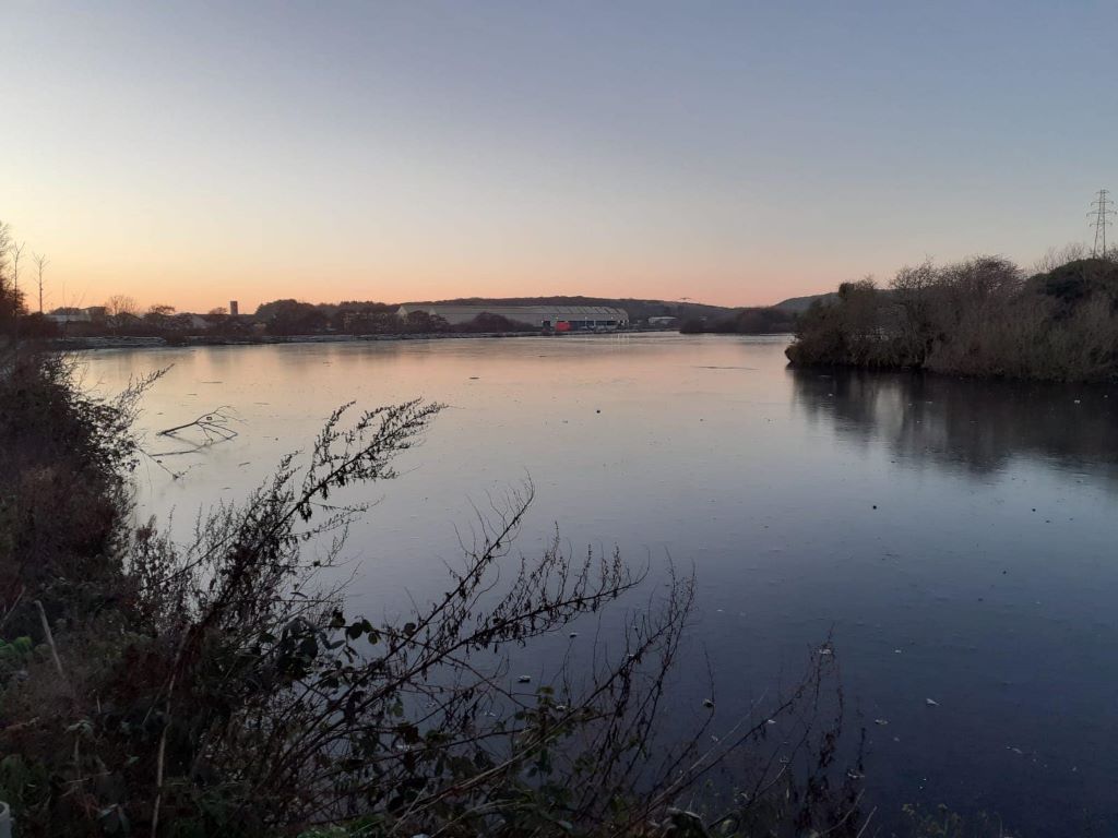 View over reservoir at dusk